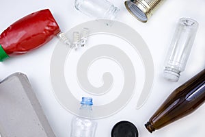Assortment of Recyclable Materials on a White Surface