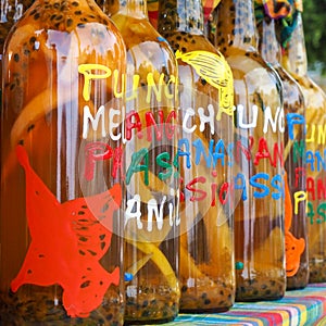 Assortment of rhum bottles at the market, squared format