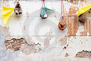 Assortment of Spanish handcrafted wineskin hanging on the  facade photo