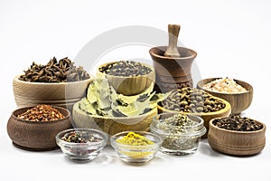 Assortment of spices close-up isolated on white background