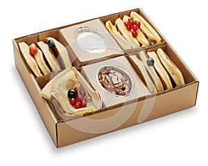 Assortment of sweets, fruits, pancakes and cookies