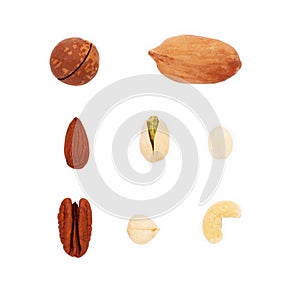 Assortment of tasty nuts on white background