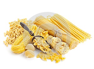 Assortment of uncooked pasta on white photo