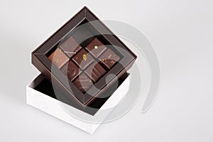 Assortment of variety fine artisanal chocolate pralines candies in little gift box