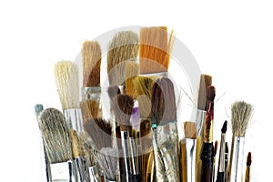Assortment of various types and sizes of paintbrushes