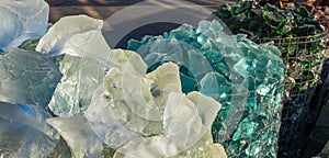 Assortment of volcanic glass. Large cobblestones. Close-up, texture.