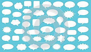 Collection of varied white speech bubbles on a light blue background