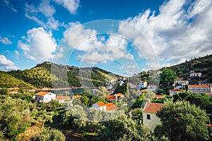 Assos town village, Kefalonia island, Greece. Beautiful cloudscape in sky