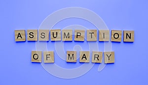 Assumption of the Blessed Virgin Mary, minimalistic banner with the inscription in wooden letters