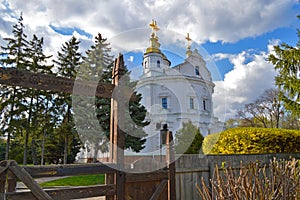 Assumption Cathedral in Poltava, Ukraine. Wooden carved gates at