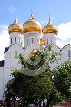 Assumption Church in Yaroslavl, Russia. Green trees.