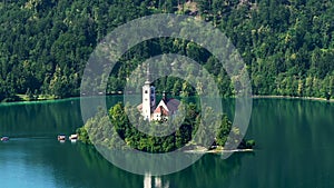 Assumption of Mary church located on lake Bled, Slovenia travel, aerial view