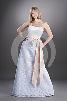 Assured bride in wedding gown photo