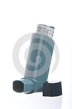 Asthma inhaler on white background