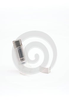 Asthma inhaler on white, copy space. Aerosol for inhalation, treatment of bronchial asthma, COPD.