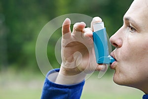 Asthma patient inhaling medication