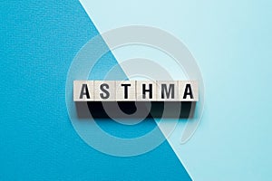 Asthma word concept on cubes