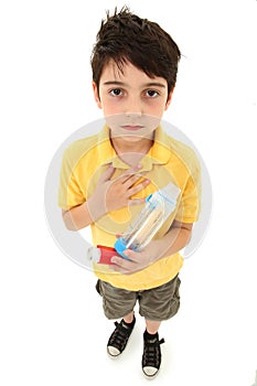 Asthmatic Child with Inhaler and Spacer Chamber photo