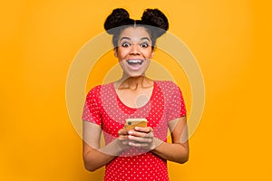 Astonished crazy afro american girl use smartphone follow social network news impressed many comments on post scream wow