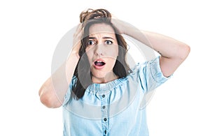 Astonished happy girl with hands on his head, isolated on white background. Positive news. Ecstatic pretty woman