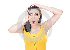 Astonished happy girl with hands on his head, isolated on white background. Positive news. Ecstatic pretty woman