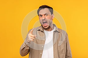Astonished Man Expressing Anger, Yelling and Pointing at Camera