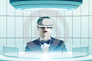 Astonished man in VR headset, holodeck