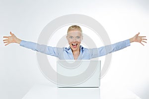 Astonished woman extends her arms