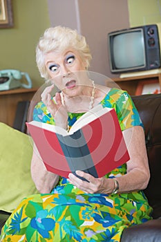 Astonished Woman Reading Book