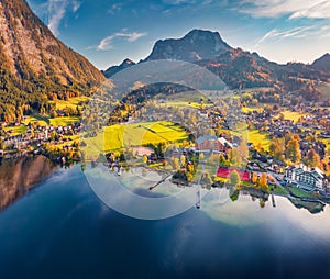 Astonishing autumn view from flying drone of Altaussee village.