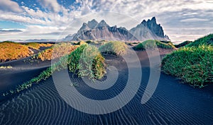 Astonishing morning view of Stokksnes cape with Vestrahorn Batman Mountain on background.