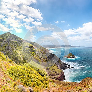 Astonishing spring view of Nebida and Fontanamare coastline with Scoglio il Morto and turquoise sea