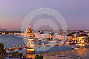 Astonishing view downtown of Budapest. Night lights landscape with illuminated the Chain Bridge and The Hungarian Parliament