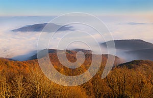View from famous Hungarian mountain top called PrÃ©dikÃ¡lÃ³szÃ©k located not far from Budapest. photo