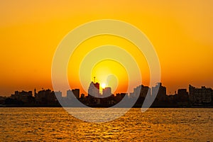 Astonishing view of the sunset on the Nile river from a boat of the city of Cairo, Africa