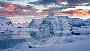 Astonishing winter sunrise over polar circle photo