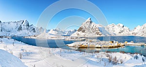 Astonishing winter view of Sakrisoy village and snowy mountaines on background