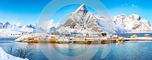 Astonishing winter view of Sakrisoy village and snowy mountaines on background