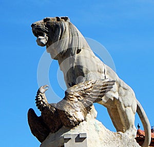 statue of a lyon and a eagle photo