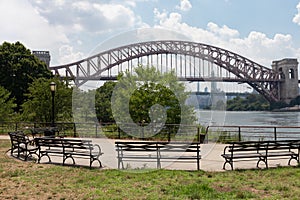 Astoria Queens Riverfront Park along the East River in New York City during Summer with the Hell Gate Bridge