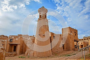 High minaret of the ancient mosque in Sarai Batu mongol settlement photo