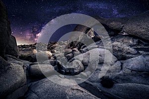 Astro Photographer in the desert and view of Milky Way Galaxy photo