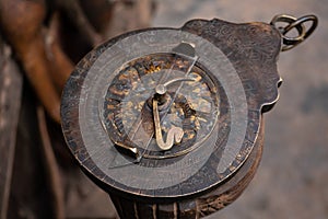 Astrolabe - an ancient compass tool made by desert Berber people in Maghreb photo
