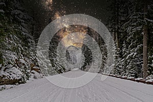 Astrolandscape of a snowy forest road