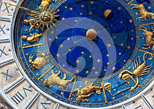 Astrological signs on ancient clock Torre dell`Orologio, Venice, Italy. Medieval Zodiac wheel and constellations