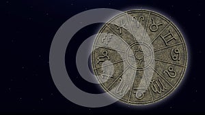 Astrological zodiac signs inside of stone horoscope circle