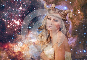 Astrology. Aries Zodiac Sign. Woman on night sky background