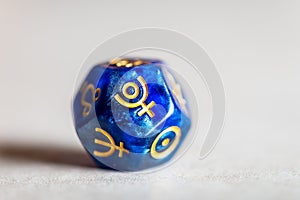 Astrology Dice with symbol of the planet Pluto