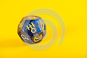 Astrology Dice with symbol of the planet Uranus