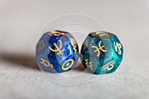 Astrology Dice with zodiac symbol of Pisces and its ruling planet Neptune